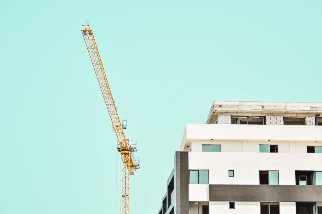 crane beside a building